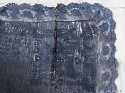 Traditional dyed-to-blue Schwalm decorative handkerchief with bobbin lace, whitework and Cross stitch crowns and initials.